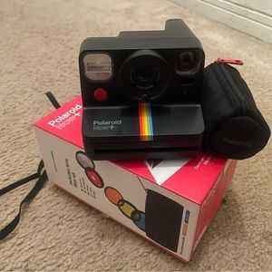 Brand new Polaroid Now + camera with lens